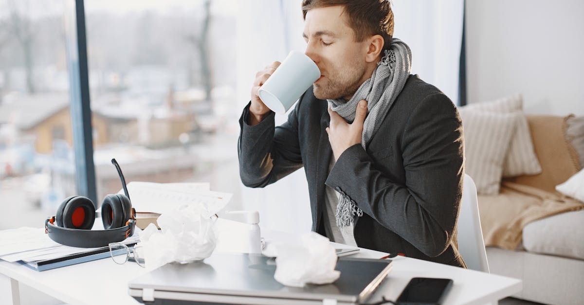 Parent gently combing a child's hair at home