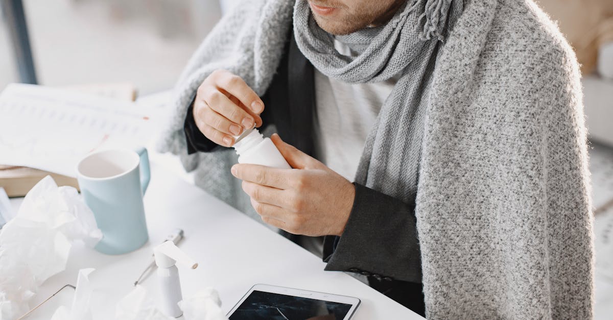 Person sitting peacefully on a bench in a Wakefield park during spring