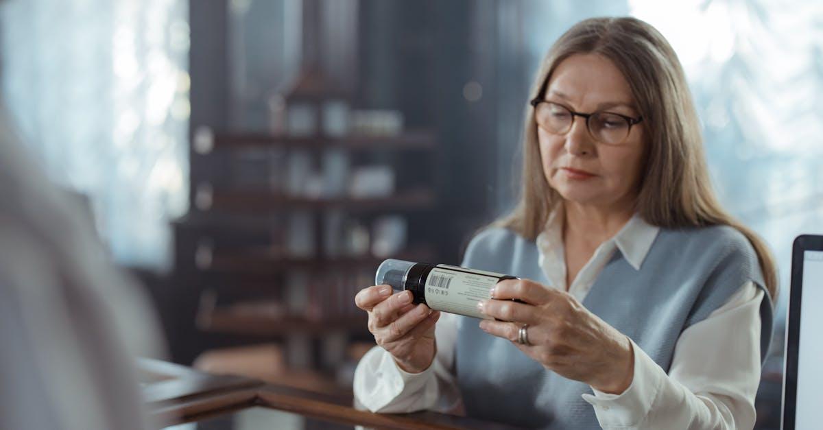 Pharmacist in consultation with a patient in a private room