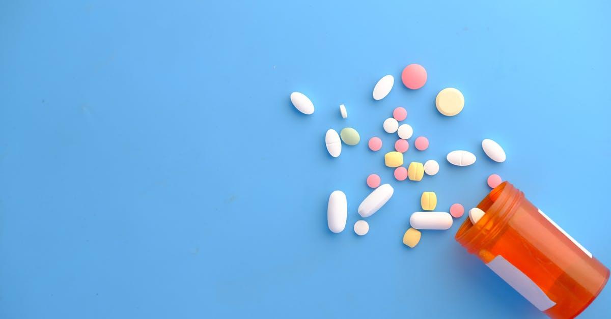 Patient discussing a medication change with a pharmacist at a Wakefield pharmacy counter