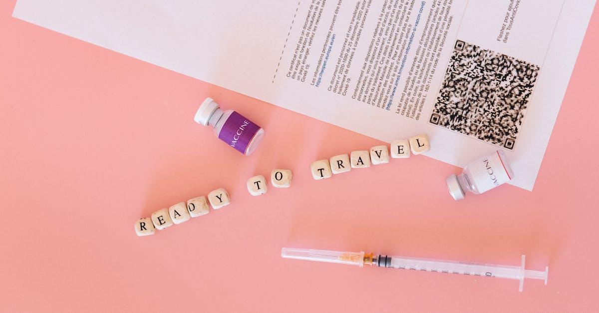 Travel vaccination syringe and passport on a pharmacy consultation desk