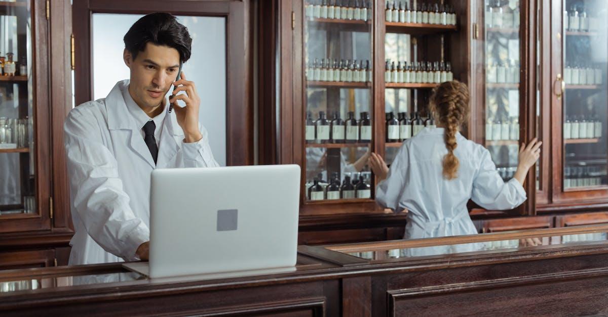 Pharmacist advising a customer at the pharmacy counter in Wakefield