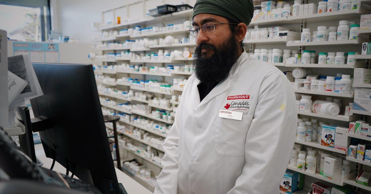 Pharmacist explaining a new medication to a patient