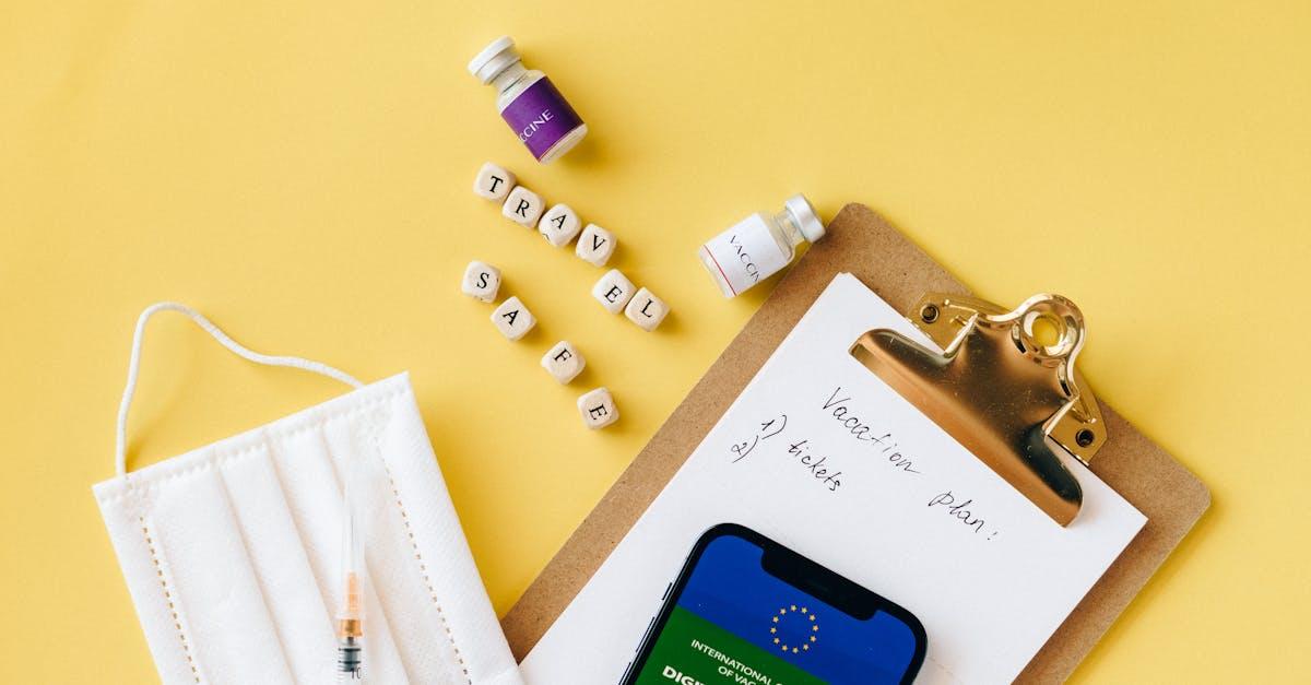 Travel health supplies including sun cream and a travel health card